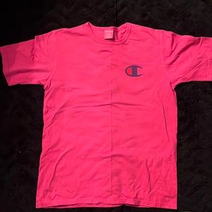 Large Mens pink champion t-shirt with champion emblem on the right side.